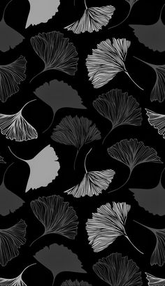 a black and white pattern with leaves on it