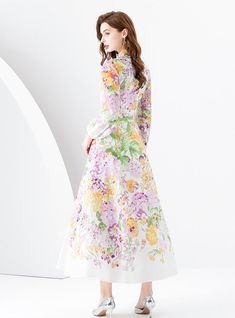 "Bloom into elegance with this pastel-hued masterpiece, a dress that intertwines the gentleness of a spring garden with the grace of high fashion. Boasting an ethereal array of floral designs, this piece is a sartorial tribute to the tender beauty of nature. Its full-length sleeves and high mandarin collar lend a vintage touch, while the fitted waist—highlighted by a delicate belt—creates a flattering silhouette. Crafted from a lightweight, flowing fabric, the dress moves with a dreamlike quality. The soft palette of pinks, greens, and lilacs paints a picture of serene loveliness, perfect for garden parties, springtime weddings, or simply when one wishes to carry the freshness of spring wherever they go." Fabric name: chiffonPattern: printingSkirt length: long skirtSkirt type: flounce skir Elegant A-line Floral Dress For Spring, Spring Feminine A-line Dress, Feminine A-line Spring Dress, Pink A-line Maxi Dress For Spring, Feminine Spring Maxi Dress For Garden Party, Feminine Maxi Dress For Garden Party In Spring, Feminine Floral Embroidered Maxi Dress For Garden Party, Feminine Maxi Dress With Floral Embroidery For Garden Party, Long Sleeve Midi Dress For Spring Garden Party