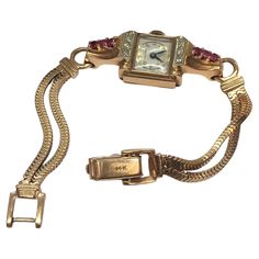 Lady's Charles Areni 14K Rose Gold Mechanical Watch Ruby Diamond Retro 1940s Wrist Length 6.5 inch Case 15 mm by 38 mm, 6 round cut Ruby(Not tested) at 2.2 mm, 6 Round Single Cut Diamonds Bracelet 7 mm wide Marking "14K" Condition working not tested for time, no damage, see pictures Ruby Rose, Ruby Diamond, Mechanical Watch, Or Rose, Diamond Bracelet, Round Cut, Wrist Watch, Diamond Cuts, Jewelry Watches