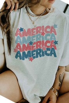 AMERICA USA STARS GRAPHIC TEE / T-SHIRTPREMIUM COTTONUNISEX SIZINGCLASSIC FITBEST OF THE BEST Patriotic Star Print Short Sleeve T-shirt, Patriotic Short Sleeve T-shirt With Star Print, American Retro Summer Tops With Letter Print, American Retro Letter Print Tops For Summer, Summer American Retro Letter Print Tops, Stars Graphic, Patriotic Fashion, Plus Size Tees, Patriotic Outfit