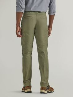 RUGGED AND OUTDOORSY Rugged and outdoorsy, these Wrangler® men's utility pants offer outdoor function and comfort to help you make the most of time spent in the great outdoors. They're made from a comfortable blend of cotton with a bit of stretch to prioritize maximum mobility at all times. The pant's slash front pockets, welt hip pockets, side patch cargo pocket, and side welt pocket give you plenty of storage space for all the essentials—phone, keys, wallet, and more. Enhanced with moisture-wi Rugged Straight Leg Outdoor Pants, Rugged Straight Leg Cargo Pants For Outdoor, Rugged Straight Leg Pants For Outdoor, Fitted Utility Cargo Pants For Outdoor Activities, Rugged Outdoor Bottoms With Side Pockets, Rugged Straight Leg Bottoms For Outdoor, Rugged Bottoms With Side Pockets For Outdoor, Utility Full Length Work Pants For Outdoor Activities, Relaxed Fit Utility Work Pants For Outdoor