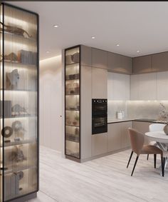 a dining room table surrounded by chairs and shelves