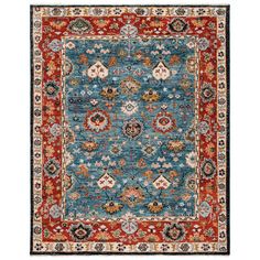 a blue and red rug with an ornate design on the bottom, in different colors