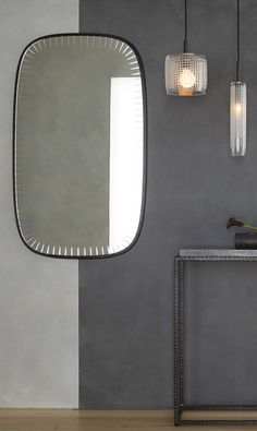 a mirror and table in a room