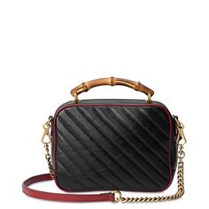 GG Marmont leather small shoulder bagQuilted leatherBamboo detailingLeather and chain-link shoulder strapSingle top handleTop zip fasteningGG motifGold-tone hardwareComposition: Bamboo 100%, Leather 100%, Gold Plated Metal 100%Lining: Microfibre 100%Depth: 3.7", Height: 6.9", Strap: 21.7", Width: 8.7"Handle: 1.4"Made in Italy Gg Marmont Small Matelassé Shoulder Bag, Gucci Gg Marmont, Gg Marmont, Bamboo Handles, Prada Handbags, Small Shoulder Bag, Quilted Leather, Black Handbags, Bag Tags