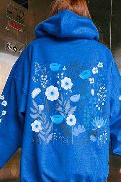 Stay cozy with this brown wildflower hoodie featuring a beautiful sleeve design—perfect for adding a touch of nature to your look! 🌼🍂 #WildflowerHoodie #NatureStyle Blue Cotton Hoodie For Spring, Blue Spring Hoodie With Adjustable Hood, Spring Blue Hoodie With Adjustable Hood, Blue Hooded Sweatshirt For Spring, Blue Hooded Hoodie For Spring, Blue Hoodie With Adjustable Hood For Spring, Blue Spring Sweatshirt With Drawstring Hood, Blue Drawstring Hood Sweatshirt For Spring, Blue Sweatshirt With Drawstring Hood For Spring