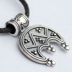 "Slavic Moon symbol/ Pagan Wiccan necklace/ Norse Viking jewelry with meaning Lunula pendant. Celtic women's amulet. Stamped 925 Sterling Silver Lunula (or Lunitsa) is a powerful female charm. Lunula (or Lunitsa) is an ancient Slavic and Viking female amulet. It symbolizes fertility, happy life and good luck. As the Moon has been always associated with female nature, the Lunula pendant is able to connect your female energy with lunar cycle. Lunula mascot is a powerful talisman against evil spiri Viking Female, Female Nature, Norse Necklace, Moon Symbol, Female Energy, Wiccan Necklace, Moon Symbols, Norse Jewelry, Viking Women