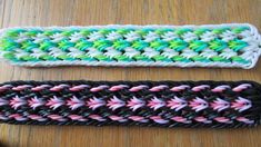 two crocheted hair ties sitting on top of a wooden table next to each other