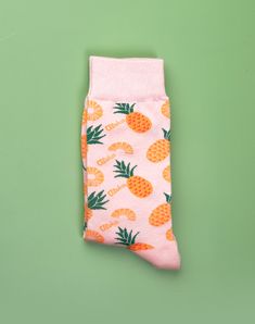 Women's tropical socks with pineapples, pineapples and more pineapples. What's not to love about the Aloha Pineapple Crew Socks with this delicious fruit on a soft pink background. These pineapple crew socks for women make a great gift for any gal who loves to show off her unique style. Whether you're wearing these pink socks to the office, out for a night on the town, or just lounging at home, the Aloha Pineapple Crew Socks are sure to bring back memories of a tropical vacation and add a touch Multicolor Socks As Summer Gift, Multicolor Socks For Summer Gifts, Playful Summer Socks As A Gift, Playful Summer Socks For Gifts, Summer Cotton Socks For Gifts, Casual Summer Socks As Gift, Casual Summer Socks For Gift, Playful Summer Gift Socks, Casual Summer Socks For Gifts