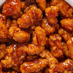 sweet and sour chicken in a white bowl