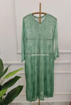 DESCRIPTION Kurta Fabric:  Georgette Viscose  Sleeves: 3/4 Sleeves Length : 46-47 inches Style: Ethnic Wear Occasion: Ethnic Wear, Party Wear Package Contains : 1x Kurti with inner Green Chikankari Embroidery Kaftan For Wedding, Green Bollywood Kaftan With Chikankari Embroidery, Traditional Long Sleeve Wear With Lace Work, Traditional Fitted Kaftan With Chikankari Embroidery, Fitted Traditional Kaftan With Chikankari Embroidery, Green Long Sleeve Set With Lace Work, Green Long Sleeve Sets With Lace Work, Designer Long Sleeve Kurta With Lace Work, Bohemian Long Sleeve Salwar Kameez With Cutdana