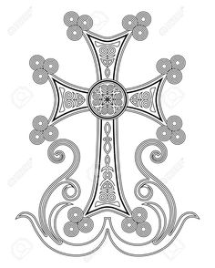 an ornate cross in black and white with swirls on the sides, as if it is