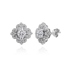 These breathtaking earrings showcase 5mm cubic zirconia center stones set in a dazzling CZ Fleur De Lis design, a must-have item for any holiday and evening celebration. The earrings secure by post with friction-backs and are made of .925 sterling silver. These earrings are the perfect addition to any jewelry collection and can be purchased as stud earrings for women and stud earrings for teen girls. Product Details Metal Type sterling-silver Metal Stamp 925-sterling Weight 3.4GR Length 11MM Wid Sterling Silver Diamond Earrings With Sparkling Stones, Fine Jewelry Earrings With Sparkling Round Stones, Anniversary Round Cut Cubic Zirconia Cluster Earrings, Cubic Zirconia Round Cut Diamond Earrings, Sterling Silver Cluster Earrings With Diamond Accents, Round Cut Cubic Zirconia Diamond Earrings, Diamond White Diamond Earrings With Sparkling Stones, Dazzling Diamond Earrings With Round Cut Sparkling Stones, Silver Diamond Earrings With Round Accents