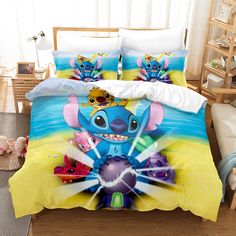 the bed is made up with colorful sheets and pillows, including an elephant on it