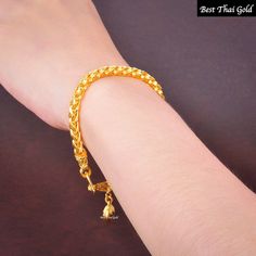 This Shop has a Special Free Gift (Chain) for Every Order. 😊🙏 Item: 1 x Bracelet For: Unisex Type: GOLD PLATED over Brass, Nickel free Gold Purity: 96.5% Surface: Sand Matted Length: ~ 7 inches Weight: ~ 14 grams Color: Yellow Gold (slightly +/- from photo) Handmade from Thailand. Thai gold plating technic really solid and stunning look. Rewarding your life from hard working, match up your dress, bridesmaid wedding engagement or a gift to someone special for you. The Craftsmanship of Thai Jewe Gold-plated Charm Bracelet For Weddings, Elegant Gold Bangle With Latkans, Gold Bangle Bracelets With Latkans, Gold Bracelet With Latkans, Gold Bracelets With Latkans For Festivals, Gold Bracelets With Latkans For Wedding, Gold Wedding Bracelets With Latkans, Gold Bracelet With Latkans For Puja, Traditional Gold Plated Chain Bracelet