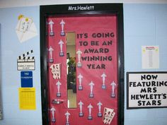 a door decorated with stickers and writing on the front is saying it's going to be an award winning year