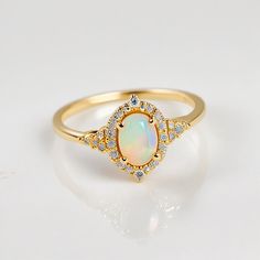 Opal ring for women gold, sterling silver Genuine opal ring vintage opal ring white gold, opal jewelry Handmade Jewelry Opal Ring for Women - Vintage Gold and Sterling Silver Opal Jewelry Description: Elevate your style with our exquisite Handmade Opal Ring for Women, meticulously crafted to capture the timeless allure of opals. Available in both classic sterling silver and elegant gold, this vintage-inspired piece is a true testament to opal's natural beauty. Specifications: Material: Solid 925 Luxury Adjustable Opal Ring For Gift, Gold Opal Jewelry, Vintage Opal Ring, Ring For Women Gold, Opal Ring Vintage, Jewelry Opal, Timeless Ring, Ring White Gold, Opal Ring