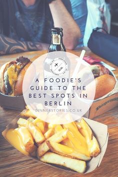 a man sitting at a table with some food in front of him and the caption reads, a foodie's guide to the best spots in berlin