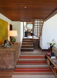 an image of a living room with stairs