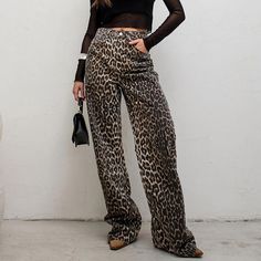 Introducing our trendy and bold high waist leopard print straight pants, perfect for those who love to make a statement with their streetwear style! These pants are made of 100% pure cotton, providing both comfort and breathability for all-day wear. Whether you're running errands or going to work, these pants are versatile enough to wear for any occasion. The straight leg cut provides a flattering silhouette, while the high waist design elongates your legs for a taller appearance. The leopard pr Leopard Trousers, Streetwear Mode, High Waist Fashion, Printed Trousers, Streetwear Style, Outfit Making, Women Shirts Blouse, Mens Accessories Fashion, Type Of Pants