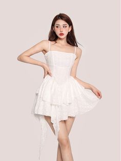 Age: 18-24 years oldSize: S M LPattern: Other/otherStyle: SexyCollar: Other/otherWaist type: High waistColor classification: white openwork White not openworkSleeve type: OtherCombination form: single pieceSKU: X23Q6932Skirt type: Puffy skirtSeason: Spring and summerYear Season: Summer 2023Skirt length: Short skirtStyle: SlingSilhouette: Type AMaterial composition: Other materials White Fitted Flirty Suspender Dress, Fitted White Suspender Dress With Ruffles, Chic White Hollow Out Dress, White Flirty Suspender Dress With Spaghetti Straps, White Hollow Out Dresses For Summer, Chic White Strapless Suspender Dress, Flirty White Suspender Dress With Spaghetti Straps, White Sleeveless Ruffled Suspender Dress, White Sleeveless Suspender Dress With Ruffles