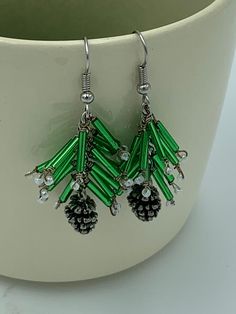 Zinc alloy pine cone charms, green bugle beads and pearl seed beads attached to a chain, resembling a pine branch dusted with snow. Beaded Pinecone, Pine Cone Jewelry, Pine Branch, Bugle Beads, Bead Jewelry, Cluster Earrings, Pine Cone, Beading Tutorials, Making Jewelry