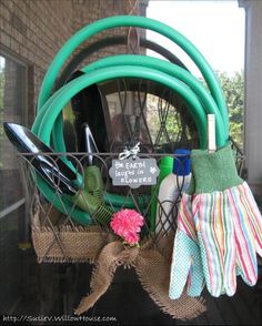 a basket filled with gardening supplies on top of a table