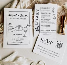 the wedding stationery is laid out next to each other