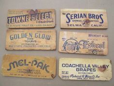 four wooden labels are hanging on the wall