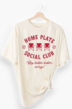 Step up to the plate in style with the Home Plate Social Club Tee! This trendy graphic tee, in a chic sand color complemented by a bold red graphic, is perfect for cheering on your favorite team. Whether you're a dedicated baseball mom or just love the game, this baseball t-shirt brings the perfect blend of comfort and flair to your wardrobe. With its soft fabric and stylish design, you'll be game-day ready and beyond stylish for any casual outing. Embrace your love for the game and make a fashionable statement with this must-have tee!   Features:  
Premium Quality Fabric 
Sand color with a striking red graphic 
Ideal for Baseball Moms 
 
Home Plate Social Club Tee - Stylish Baseball Mom Graphic T-Shirt  Shop the Home Plate Social Club Tee, a trendy sand-colored baseball t-shirt with a red Hey Batter Batter, Mom Wardrobe, Home Plate, Trendy Graphic Tees, Color Complement, Mom Tees, Baseball Mom, Social Club, Sand Color