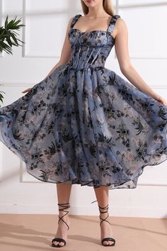 Step into a world of sophistication and exclusivity with our Straps Corset Floral Print Organza Midi Dress. Featuring delicate straps and a beautiful floral print, this dress combines art and fashion. The corset design accentuates your figure, making you feel confident and elegant. Perfect for luxurious events and special occasions. Bust and Skirt with full lining. 100% Polyester 100% Recycled polyester lining Concealed zip at center back Imported Conversion Table, Strap Dress, Steel Blue, High Heel Shoes, Dress Making, Special Occasion, Custom Sizing, Midi Dress, Floral Prints