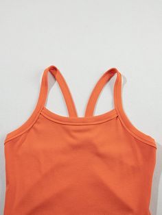 Grapefruit Orange Athletic Ribbed Cropped Cami Top Stay cool and stylish during workouts with this trendy Grapefruit Orange Athletic Ribbed Cropped Cami Top. Made of high-quality 93%Viscose+7%Elastane material, this top offers exceptional comfort and flexibility for unrestricted movement. Key Features: Material: 93%Viscose+7%Elastane Style: Casual, active Pattern: Solid Season: Summer Occasion: Daily, Outdoor Color: Grapefruit Orange Benefits: Exceptional comfort and flexibility Ribbed texture for a touch of sophistication Versatile piece for athletic activities and casual wear Pairs well with high waist pants to show off a sexy curve Orange Benefits, Oranges Benefits, Citrus Twist, Cropped Cami, Cami Crop Top, Cami Top, Cami Tops, Crop Tank, High Waisted Pants