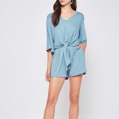 Brand New Boutique Item! Dusty Blue Romper With Bell Sleeves, Tie Waist, And Hidden Pockets By Beeson River. Rayon/Spandex Material Which Is Soft And Stretchy. Small Fits Size 2-4 And Xl Fits Size 14-16. Tags: Summer, Beach, Resort, Cruise, Vacation, Bellamie, Jumper, Jumpsuit, Light Blue, Playsuit Blue Short-length Jumpsuits And Rompers For Spring, Chic Light Blue V-neck Jumpsuit, Casual Blue Short Length Jumpsuits And Rompers, Chic Light Blue V-neck Jumpsuits And Rompers, Chic Short Blue Tops, Light Blue V-neck Jumpsuits And Rompers For Casual Wear, Casual Light Blue V-neck Jumpsuits And Rompers, Light Blue V-neck Jumpsuit For The Beach, Light Blue V-neck Jumpsuit For Beach