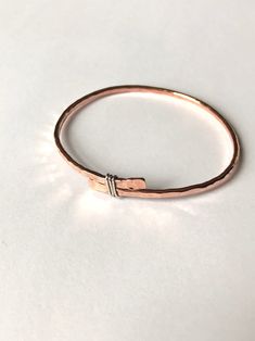 Skinny Copper Bangle With Sterling Silver Knot Hammered Copper Bangle 7th Anniversary Gift Cuivre Bracelet - Etsy Handmade Copper Bangle Bracelets, Hand Forged Copper Bangle Bracelet, Hammered Copper Bangle Bracelets, Hammered Copper Bangle Bracelet, Adjustable Hammered Rose Gold Bangle, Hand Wrapped Silver Copper Bangle, Hammered Rose Gold Bangle, Adjustable Hammered Sterling Silver Bangle, Adjustable Rose Gold Sterling Silver Bracelet As Gift