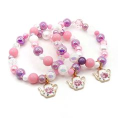 These adorable set of 10 bracelets is the perfect favor for your little one's tea themed party!  Each bracelet features an enameled floral teapot charm and an assortment of pink, orchid and white 6-10mm acrylic beads strung with durable stretch cord. Each bracelet comes individually packaged in organza bags.  Please message me if you have any questions.  * Estimated delivery dates are calculated by Etsy using the most optimistic conditions and are not guaranteed.  * The exact bead styles and sha Tea Themed Party, Skate Party Favors, Bead Styles, Party Bracelets, Floral Teapot, Princess Tea Party, Birthday Bracelet, Cardboard Jewelry Boxes, Tea Party Birthday