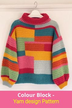 a colorful sweater hanging on a wall with the text, color block yarn design pattern