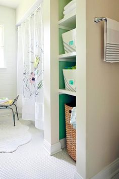 the bathroom is clean and ready to be used as a storage area for toiletries