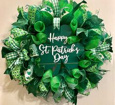 a st patrick's day wreath with the words happy st patrick's day on it