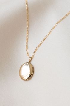 The perfect locket to hold what's most special to you! Our Oval Locket Necklace is simple enough to wear everyday and looks great layered! Gold filled or sterling silver - perfect for everyday wear without tarnishing. AND they’re affordable. Find more at Simple & Dainty! Oval Link Necklaces With Vintage Charm For Gifts, Vintage Charm Oval Link Necklace As Gift, Oval Pendant Locket Necklace With Adjustable Chain For Keepsake, Classic Locket Necklace With Adjustable Chain As Gift, Dainty Oval Locket Necklace For Anniversary, Dainty Everyday Locket Necklace, Oval Locket Jewelry For Everyday, Dainty Oval Pendant Locket Necklace For Anniversary, Dainty Oval Personalized Locket Necklace