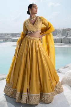 Buy Yellow Lehenga And Blouse: Shimmer Chanderi & Dupatta: Net Set For Women by Seeaash Online at Aza Fashions. Luxury Yellow Georgette Blouse Piece, Luxury Yellow Georgette Lehenga, Luxury Orange Chanderi Lehenga, Luxury Yellow Lehenga With Cutdana, Luxury Yellow Tussar Silk Lehenga, Luxury Yellow Chanderi Blouse, Luxury Yellow Lehenga In Silk Blend, Luxury Yellow Raw Silk Choli, Luxury Yellow Cotton Silk Lehenga