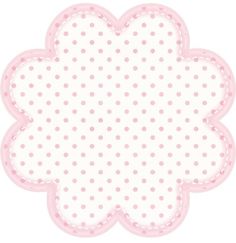 a white and pink flower shaped object with polka dots