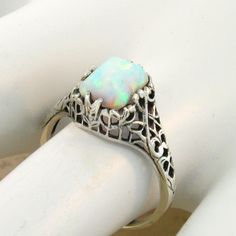 Vintage Estate Lab Created Cabochon Cut Opal Solitaire Filigree Ring. 925 Solid Sterling Silver. Stamped 925. Excellent Condition/Like New. Heirloom White Opal Ring In Sterling Silver, Classic White Opal Ring For Gift, Classic White Oval Filigree Ring, Classic White Opal Ring, Heirloom White Cabochon Rings, Classic Cabochon Opal Ring As Gift, Classic Cabochon Opal Ring For Anniversary, Antique Sterling Silver Opal Ring For Anniversary, Classic Wedding Filigree Ring With Cabochon