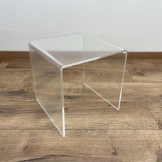 A small Lucite Acrylic Side Table Plexiglass Stand Coffee Table A clean, elegant and well preserved side table, from Germany supposedly from the 80's. The table is manufactured of massive (0.7 cm thick) bended acrylic plate. An iconic statement from the last century. Well kept, clean and in fully operational condition. All surfaces were carefully polished. Nevertheless there might be some tiny, almost invisible scratches available. Dimensions: Height : 31.5 cm / 12.4"  Width: 30 cm / 11.81" Dept Acrylic Side Table, Lucite Coffee Tables, Cube Side Table, Coffee And End Tables, Plexus Products, Vintage Finds, Living Furniture, Patina, End Tables