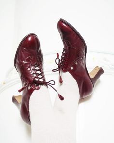 Amazing and rare burgundy 1930s shoes with cut outs<3  Beautiful open lacing and details... Handmade by Lindbloms in Kumla, Sweden. Marked size EU 39,  but see measurements: Inside length 25.3 cm/ 9.96"  Heels are 7 cm/ 2.75"  and they are 8.6 cm/ 3.38" wide underneath  Excellent condition. New rubber soles. Vintage Heels With Brogue Detailing And Round Toe, Vintage High Heel For Fall, Vintage Pointed Toe Heels With Brogue Detailing, Vintage Heels With Brogue Detailing And Almond Toe, Vintage High Heels For Fall, Vintage Red Heels For Fall, Vintage Almond Toe Heels With Brogue Detailing, Vintage Lace-up Fall Heels, Vintage Closed Toe Heels For Fall