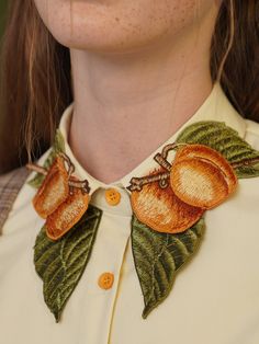 A blouse depicting an apricot that bears fruit during the rainy season and has a sweet and gentle scent. Embroidered on the neck like a fruit, you will be enchanted by its shining color. It is an item that you can play with beautiful art with a design that reproduces even the veins of the leaf.



 <Size>



 small size






 Length: 67cm

 Shoulder width: 55cm

 Bust: 112cm

 Sleeve length: 51.5cm




 medium size



 Length: 68.5cm

 Shoulder width: 57cm

 Bust: 116cm

 Sleeve length: 52cm Fruit Embroidery, Apricot Fruit, Diy Vetement, Cottagecore Style, Embroidered Collars, Rainy Season, Embroidery Blouse, Embroidery Inspiration, Character Outfits