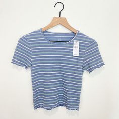 Peep This Adorable Crewneck Baby Doll Tee From American Eagle! Striped In Sweet Blue, Mint Green, And Ivory. Lightweight Waffle Knit. Cropped Tshirt. Lettuce Edge On Bottom Hem And Sleeves. Brand Name: American Eagle Market: Women’s, Tshirts, Cropped Tee Size: Small Color: Blue, Mint Green, Ivory, Striped Material: 57% Cotton, 43% Polyester Measurements: 14” Chest, 16.5” Long From Shoulder Seam Down Condition: Nwt, No Flaws Cute Ribbed Tops, Striped Ribbed Cotton Top, Cute Ribbed Cotton Tops, Trendy Blue Ribbed T-shirt, Blue Ribbed T-shirt For Spring, Spring Blue Ribbed T-shirt, Animal Print Crop Tops, Cropped Tshirt, American Eagle Crop Top