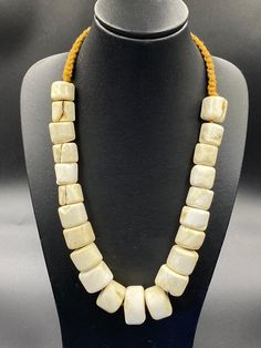 Old ancient African shell beaded necklace Traditional White Necklaces With Natural Stones, Traditional Adjustable Rectangular Necklace, Traditional Adjustable Rectangular Necklaces, Traditional Single Strand Necklaces For Festivals, Traditional Single Strand Festival Jewelry, Traditional Single Strand Jewelry For Festival, Handmade Spiritual Shell Necklace With Round Beads, Traditional Beaded Beige Jewelry, Traditional Cream Necklace As A Gift