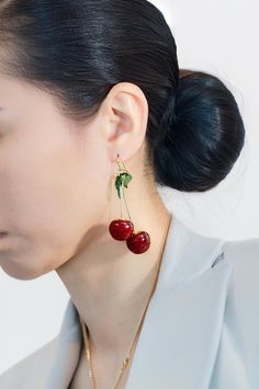 C H E R R Y ∙ D A N G L E  ∙ E A R R I N G S Add a playful touch to your style with these gold cherry red dangle earrings. Featuring dainty cherries, these charming fruit dangle earrings are perfect for any occasion, whether you're looking for a cute gift for a fruit lover or a stylish addition to your collection. * Finish/Material: 18K Gold Plated Over Sterling Silver * Dimensions: 7cm x 3cm * Waterproof and Sustainable: These earrings are crafted to be both durable and eco-friendly, ensuring l Elegant Dangle Jewelry With Fruit Design, Elegant Cherry Drop Earrings, Red Fruit Design Drop Earrings, Gold Cherry Earrings, Trendy Cherry-colored Earrings, Fruit Jewelry, Cute Fruit, Cherry Red, Cute Gifts