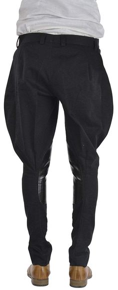 Vintage style Black Leather knee patches horse back riding ankle length Jodhpurs baggy breeches made from black color pure cotton fabric Traditional black leather knee patches It can wear man and woman both for riding, sports, outdoors or any events Sizes available according waist: 32, 34, 36, 38 and made to measure For Made to measure: We will send you measurement form after your order Free shipping worldwide Black Western Style Bottoms For Fall, Full Length Workwear Breeches With Pockets, Fitted Black Riding Bottoms, Fitted Breeches With Pockets For Fall, Fall Fitted Breeches With Pockets, Fitted Breeches With Belt Loops For Fall, Fitted Fall Breeches With Belt Loops, Horse Riding Jodhpurs, Riding Trousers