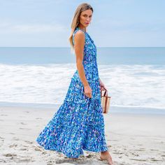 Make a bold statement at your next event with our Abstract Sleeveless Ruffle Maxi Dress. This dress features a dynamic abstract print that captures attention, while the flowing silhouette adds a touch of romance and movement. Whether you're lounging by the pool, exploring a new destination, or attending a casual outdoor event, this versatile piece will keep you looking effortlessly chic and feeling comfortable all day long. Product code: CAA05A4E095TD Chic Sleeveless Maxi Dress With Abstract Print, Blue Sleeveless Dresses With Abstract Print, Sleeveless Abstract Print Dress For Vacation, Flowy Summer Maxi Dress With Abstract Print, Flowy Abstract Print Maxi Dress For Summer, Spring Sleeveless Abstract Print Dress, Spring Sleeveless Dress With Abstract Print, Blue Tiered Sleeveless Dress For Beach, Sleeveless Spring Dress With Abstract Print